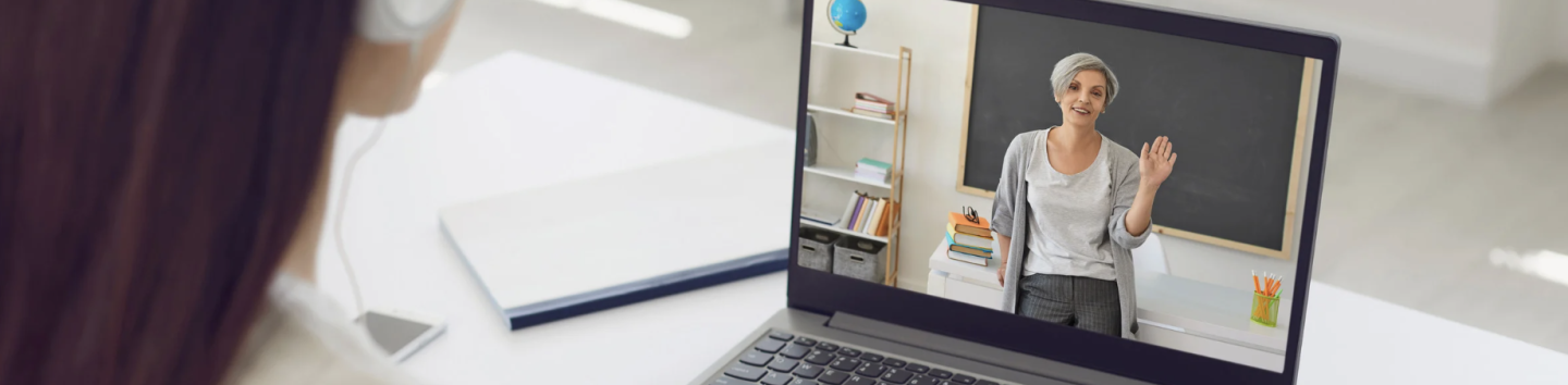Online Technology for the Classroom women on computer screen