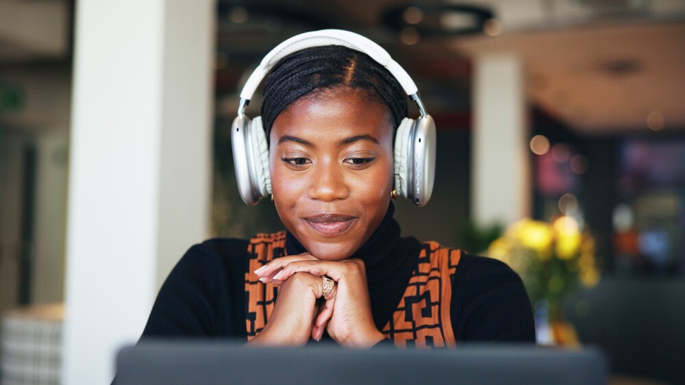 Headphones,,Laptop,And,Webinar,With,Business,Black,Woman,In,Office