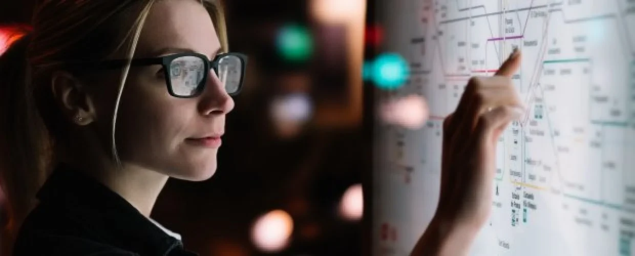 female looking at a digital screen