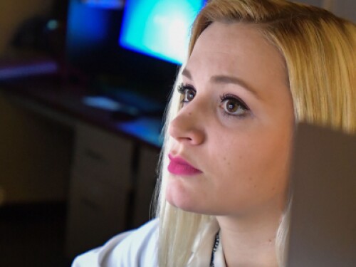 educational technologist works at computer