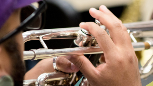 student playing trumpet
