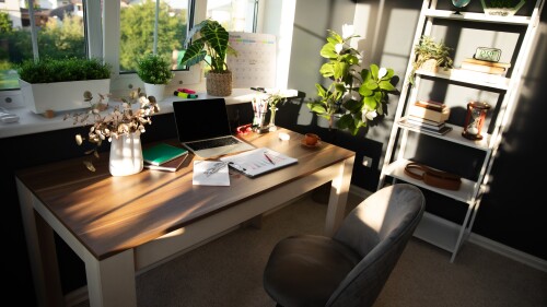 Modern,,Sunlit,Office,Desk,Is,Neatly,Arranged,With,Laptop,,Documents,