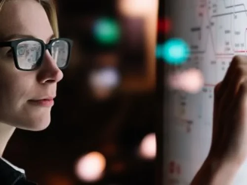 female looking at a digital screen