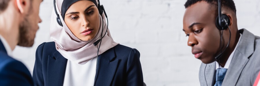 interpreters listening with headsets