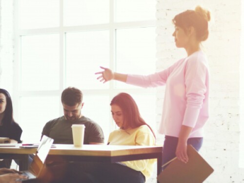 professionals brainstorming in well-lit warehouse office