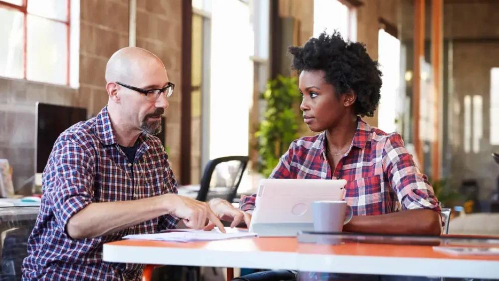 man woman at table