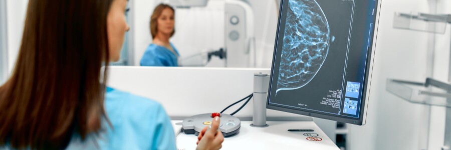mammographer analyzes image from mammogram