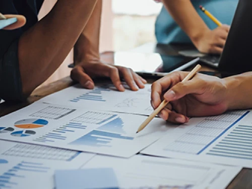 Students working on graphs and charts